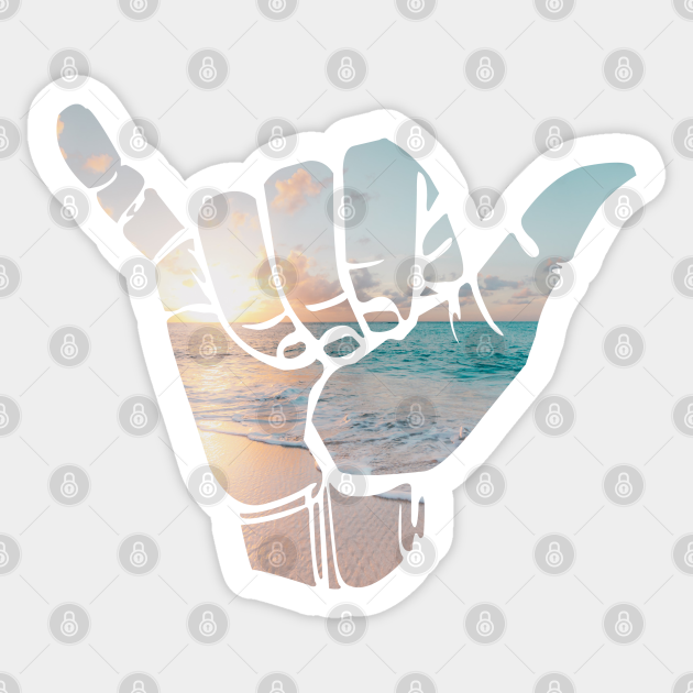 Shaka hang loose hand gesture with photograph of beach sunset Shaka